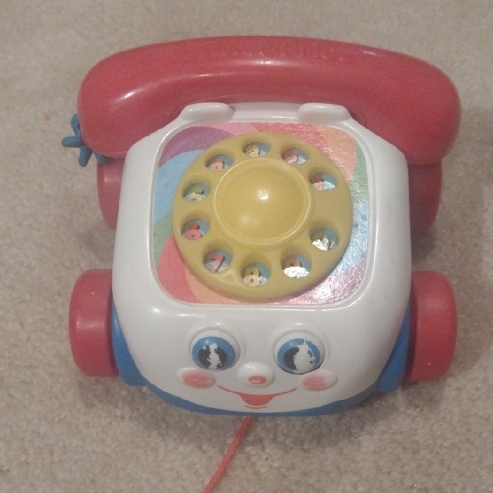 Vintage Pull Toy By Fischer price Rotary Style Toy Phone for Toddlers.